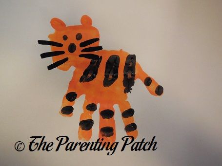 T Is for Tiger Handprint Craft | Parenting Patch T Is For, T Is For Tiger, Handprint Alphabet, Circus Week, Handprint And Footprint Crafts, Letter T Crafts, Make A Letter, Craft Handprint, Circus Crafts