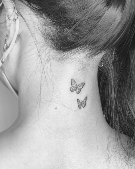 Fine line butterflies tattoo on the back of the neck. Tattoo Ideas Butterfly, Back Of Neck Tattoos For Women, Tattoo On The Back, Butterfly Neck Tattoo, Simple Butterfly Tattoo, Butterflies Tattoo, Small Neck Tattoos, Girl Neck Tattoos, Butterfly Back Tattoo