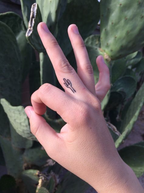 Small cute cactus finger tattoo Tiny Finger Tattoos, Cowgirl Tattoos, Cowboy Tattoos, Small Finger Tattoos, Cactus Tattoo, Finger Tattoo For Women, Western Tattoos, Shape Tattoo, Small Girl Tattoos