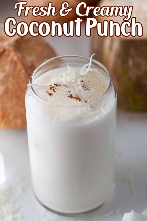 Creamy Coconut Punch with shredded coconut and cinnamon sprinkled on top. Coconut Punch, Coconut Milk Drink, Coconut Drinks, Drink Recipes Nonalcoholic, Punch Recipe, Brown Spots Removal, Fresh Coconut, Milk Shakes, Coconut Recipes