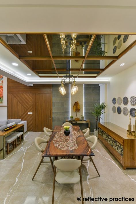 Residence Design with An Asymmetrical Expression | Reflective Practices - The Architects Diary False Ceiling Design Ideas, Ceiling Design Ideas, Dining Interior, House Ceiling Design, Hall Interior Design, Ceiling Design Living Room, Ceiling Design Modern, Dining Room Interiors, Wooden Ceilings