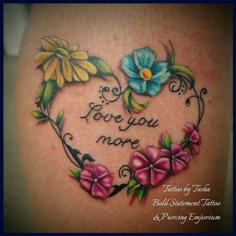 Memorial flower tattoo. Feminine ink with I love you more script. Great tattoo idea for girls Colorful Memorial Tattoos, Grandbabies Tattoo Ideas, Memorial Flower Tattoo, Unique Memorial Tattoos Mom, I Love You More Tattoo, Mother Memorial Tattoos Mom, Mom Memorial Tattoo Ideas For Daughter, Memorial Tattoo Ideas, Unique Memorial Tattoos