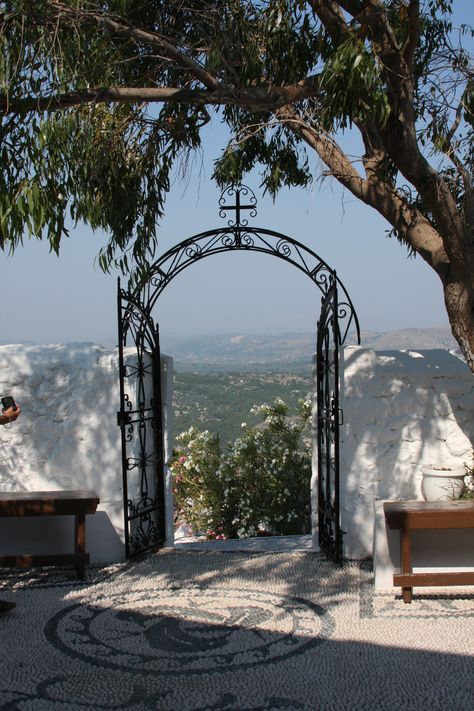 Beautiful gate at the top of the mountain leading into the Monastery of Tsambika, Rhodes, Greece. Greek Monasteries, Mediterranean Travel, Crete Island, Greek Wedding, Infused Water, Rhodes, Beautiful Villages, Mountain Top, Greek Island