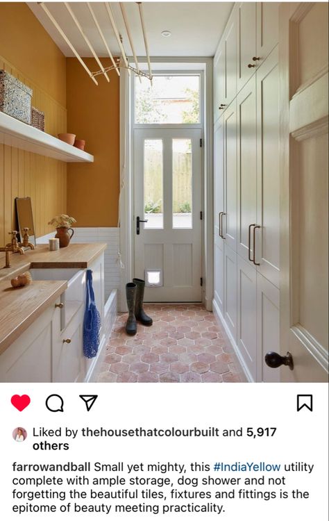 A utility room with pink tiled floor and deep yellow walls and white cupboards Yellow Laundry, Yellow Laundry Rooms, Boot Room Utility, Beautiful Tiles, Colorful Interior Design, Dog Shower, Boot Room, Fantasy House, Neutral Design