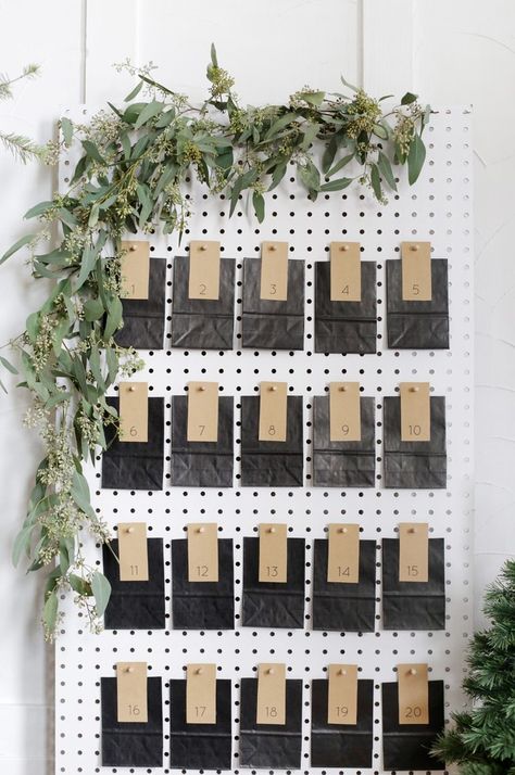 Use a piece of pegboard to create a simple advent calendar! #diy #adventcalendar #minimalchristmas Peg Board Ideas, Simple Advent Calendar, White Pegboard, Diy Pegboard, Advent Calendar Diy, Craft Fair Displays, Minimal Christmas, Crafts For Kids To Make, Diy Gift Box