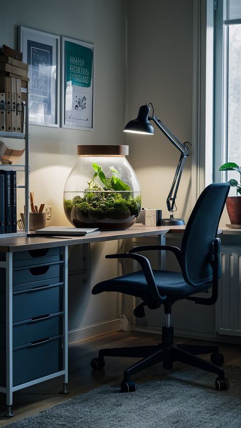 Revitalize your workspace with this stunning home office setup featuring a lush terrarium on a sleek LINNMON desk. Paired with the ergonomic MARKUS chair and the practical ALEX drawer unit, this design promotes comfort and productivity. The FJÄLLBO bookcase adds an industrial touch, while the TERTIAL desk lamp ensures you stay focused with perfect lighting. Discover how to create your own inspiring work environment that balances style and functionality! Click for tips and ideas! #HomeOffice #IKEAStyle #Terrarium #WorkspaceInspo #Productivity #InteriorDesign #Ergonomics Linnmon Desk, Ikea Style, Alex Drawer, Drawer Unit, Home Office Setup, Office Setup, Work Environment, Stay Focused, Desk Lamp