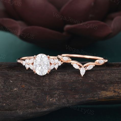 Oval moissanite ring set Rose gold butterfly engagement ring set Vintage pear cut diamond cluster ring set Art deco bridal set Promise gift ● Engagement Ring information: --main stone: moissanite --stone size & shaped: 6*8mm & oval --side stones: moissanite/diamond   0.25ct ● Wedding Band information: --stone: Moissanite or Diamond --stone weight: 0.15-0.2ct --shape: marquise 1.5*3mm & pear 2*3mm --band width & thickness: 1.2mm & 1.2mm ● Optional service: --personalized order --rush order & over Butterfly Wedding Ring Engagement, Butterfly Wedding Rings, Butterfly Wedding Ring Set, Elegant Wedding Butterfly Ring With Diamond Accents, Engagement Rings With Butterflies, Engagement Rings Boho, Wedding Rose Gold Butterfly Ring In 14k Gold, Stackable Engagement Rings, Butterfly Engagement Ring