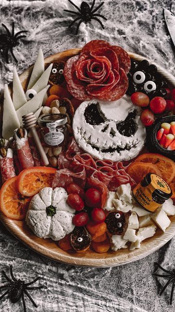 Halloween Food Ideas Charcuterie, Jack Skellington Snacks, Halloween Prosciutto Skull, Ghost Face Brie, Scream Face Brie, Halloween Pumpkin Charcuterie Board, Witch Charcuterie Board Ideas, Disney Halloween Charcuterie Board, Charcuterie Halloween Board Ideas