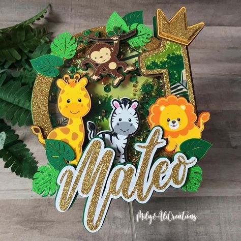 Mily&AliCreations on Instagram: “Wild One Safari Cake topper shaker with light 🌴🦁🦓🦒🌴, for the handsome baby Mateo 👑 💙💚💙💚!! (Swipe for more pictures) (DM FOR ORDER)…” Wild One Safari Cake, Safari Cake Topper, Safari Cake, Wild Birthday Party, 3d Cake Toppers, Handmade Cake Topper, Safari Cakes, Party Topper, Cake Banner Topper