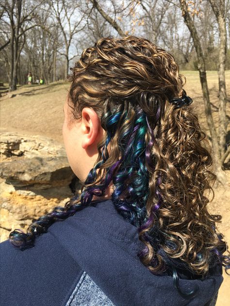 Fun oil slick coloring in curly men's hair #menshair #curlyhair #funhaircolor Curly Hair Fun Color Ideas, Curly Hair Vivid Color, Fun Curly Hair Color, Curly Hair Dyed Underneath, Hair Dyed Underneath, Undercut Curly Hair, Dyed Curly Hair, Highlights Curly Hair, Hair Color Underneath