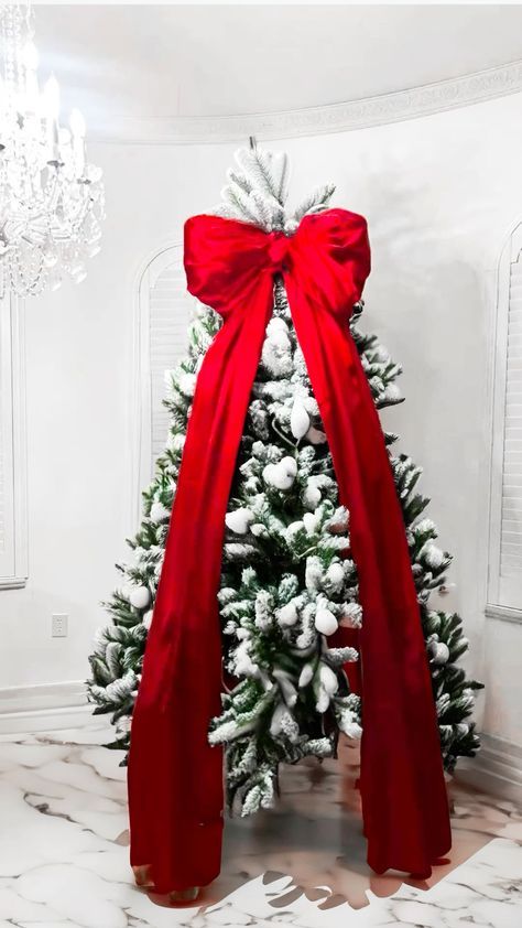 #ChristmasDecor #HolidayHome #FestiveVibes #DeckTheHalls #WinterWonderland #MerryAndBright #SeasonalStyle #HolidayDecorating #ChristmasInspo #CozyChristmas Red Bow On Christmas Tree, Big Bow Christmas Tree Topper, Large Bow Christmas Tree, Big Bow Christmas Tree, Red Bow Christmas Tree, Christmas Tree With Bows, Diy Christmas Tree Skirt, Bow Christmas Tree, Christmas Bows Diy