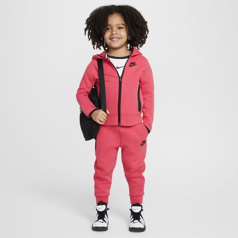 Made of bonded jersey knit fabric, this 2-piece set is inspired by the classic warmup suit. The hoodie has a full-zip closure that makes layering easy, and the matching tapered pants have ribbed cuffs and an elasticized waistband for a comfy fit the smallest athletes can play freely in. Pair with any Nike tank or tee for a completed look. Toddler Nikes, Boy Stuff, Nike Tank, Nike Tech, Tech Fleece, Tapered Pants, Jersey Knit Fabric, Comfy Fits, Nike Sportswear