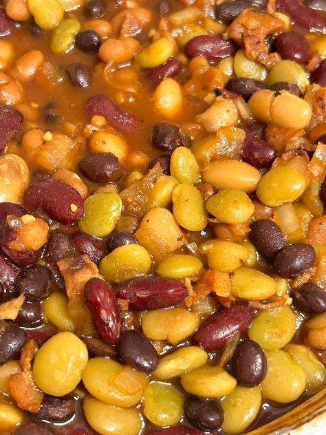 This wonderfully easy 5-bean baked beans recipe uses your choice of canned beans, bacon, and just a handful of pantry staples to make a hearty casserole-like dish. It's a classic crowd-pleaser that's perfect to serve as a main or side with other favorite comfort food dishes! 5 Bean Casserole, 7 Bean Baked Beans, Mixed Baked Beans Recipe, Mixed Bean Recipes, Baked Bean Casserole, Beans Recipe Crockpot, Vegetarian Substitutes, Baked Beans Recipe, Recipe Crockpot