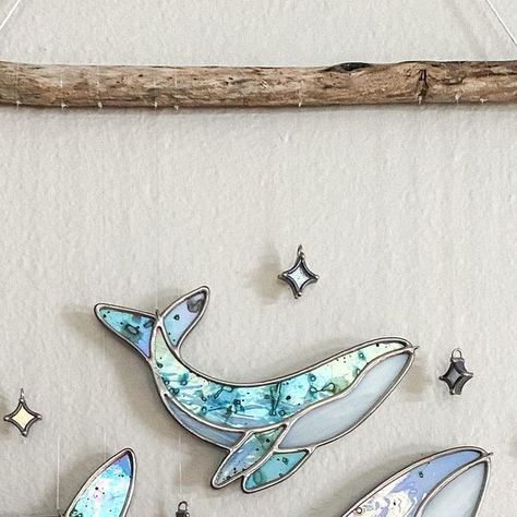 Nordquist & Co Glassworks on Instagram: "The Luna Whale collection has finally returned! 🐋✨ This limited edition collaboration between myself and Isa (@heart_of_stained_glass) was an idea we developed together about a year ago, and we are so excited to bring it back, with the addition of a pink moon colorway! 🤗 Isa creates the beautiful moon-like glass by hand painting rare, discontinued iridescent Spectrum glass, for an effect unlike any other. She sends the moon glass to me, and I turn them into these final pieces, complete with dichroic stars and Columbia River driftwood, harvested at my family’s cabin in the Gorge. There is something so special about the bond between a mother and child, and to me this celestial collection invokes that almost ethereal feeling one gets when witnessin