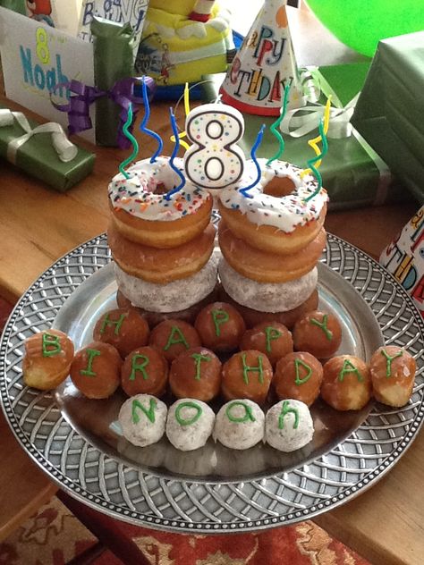 This is a fun and easy birthday cake for a boy who loves donuts! Birthday Breakfast Ideas For Kids, Birthday Breakfast Ideas, Easy Birthday Cake, Donut Birthday Cake, Breakfast Ideas For Kids, Birthday Breakfast Party, Doughnut Party, Donut Themed Birthday Party, Birthday Donuts