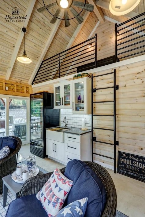 This gorgeous pool house interior blends natural accents and modern amentities. The large windows and high timber frame ceiling allow light to flood into the space. The pool house includes a small kitchen, sitting area, bathroom, and a loft where guests can spend the night. Small Pool House Kitchen, Shiplap Pool House, Pool House With Loft Bedroom, Pool House Ceiling Ideas, Barndo Pool House, Pool House Guest House Combo Plans, Pool House Guest House Combo Interior, Small Pool Guest House, Farm Pool House