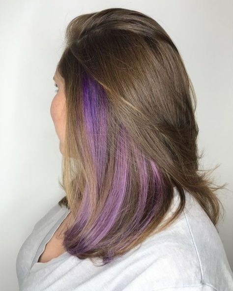 16 Blonde Hair With Purple Underneath Ideas To Try Now Peakaboo Underlights Lavender, Purple Hair Bottom Half, How To Do Purple Highlights At Home, Light Brown Hair With Purple Tips, Peakaboo Dye Natural Hair, One Streak Of Color In Hair, Hair With Purple Underneath, Blonde Hair With Purple Underneath, Peekaboo Hair Color Purple