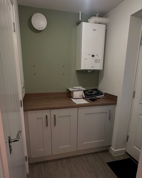 UTILITY ROOM TRANSFORMATION! ✨🤩☁️ The difference it has made adding cupboards to the top and covering the boiler. So smart and classy! I also changed the worktops and floors - what do you think?! I used @kitchenmagicltd to replace my tops and add the cupboards. A cheaper way to upgrade your kitchen - would 100% recommend! (Calum did mine - he was so lovely and did a fab job!!) Flooring: @unitedcarpetsandbeds Cabinets and doors: @kitchenmagicltd Paint: @duluxuk Timeless #utilityroom #k... Brown Herringbone Floor, Pinterest Kitchen, Utility Area, White Worktop, Glass Accessories, Herringbone Floor, Room Transformation, Ribbed Glass, Dining Room Set