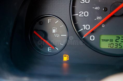 Gas Guage Empty. A gas guage in a car reads empty and shows the warning light to , #spon, #gas, #guage, #car, #Gas, #Guage #ad Car Low, Pompe A Essence, Ford Puma, Toyota Aygo, Senior Discounts, Car Fuel, Car Repair Service, Gas Lights, Gas Mileage