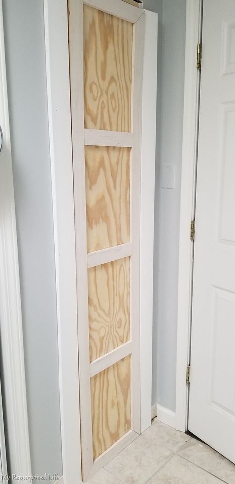 Building a closet between the studs is a great option for the kitchen or bathroom.This diy storage closet is perfect for storing tall items. #MyRepurposedLife #diy #closet #organization Between Studs Broom Closet, Tiny Broom Closet, Closet Between Studs, Between Studs Storage, Butlers Laundry, Spice Closet, Broom Closet Organization, Budget Renovations, Broom Closet Organizer