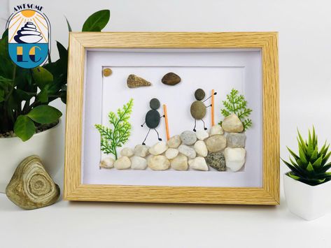 Pebble Art Mountain Climbers, Pebble art climbing, Family climbers wall art, Rock climbing painting, Camping Pebble Art,hiking rock climbing Climbing Painting, Sayings About Family, Art Rock, Spiritual Symbols, Family Images, Family Pets, Mountain Climbers, Anniversary Dates, Memorial Keepsakes