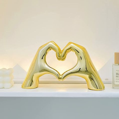 Gold hand heart statue room decor is perfect for any swiftie who wants a stuble Taylor Swift related decoration Room Wishlist, Gold Room Decor, Hand Statue, Modern Art Sculpture, Gold Rooms, College Room, Preppy Room Decor, Preppy Room, Redecorate Bedroom