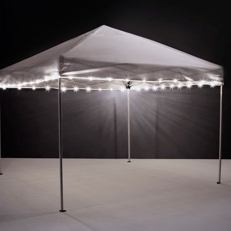 Enjoy your nights under the lights! Get your team spirit in high gear or set the mood for your cookout by lighting your tailgate canopy or patio umbrella. With 40 feet of lights that can be cut to size, there's plenty to fit a variety of canopy and umbrella sizes. These weather resistant lights come with clips to set them up and run on standard AA batteries (not included). We are dedicated to give everyone the very best houseware products for all home needs, with a focus on dependability, our cl Outdoor Umbrella Lights, Patio Umbrella Lights, Canopy Tent Outdoor, Umbrella Lights, White Canopy, Tent Lighting, Light String, Outdoor Tent, Canopy Lights