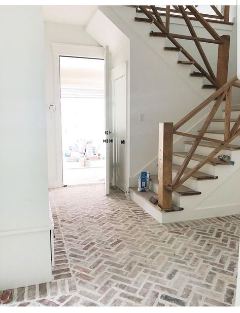 Brick floor in hallway. I love the floors and railings!! CR Southern Cozy Living Room, Tile That Goes With Dark Wood Floors, Brick To Wood Floor Transition, Kitchen Flip, Modern Farmhouse Flooring, Brick Ideas, Brick Floor, Interior Brick, Entryway Flooring