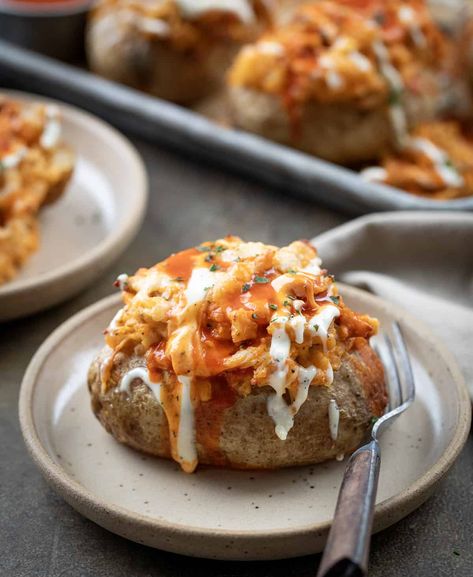 Buffalo Chicken Twice Baked Potatoes give you the flavor of your favorite saucy chicken wings stuffed into a perfectly baked potato! Stuffed Sweet Potatoes Recipes, Chicken Stuffed Potatoes, Baked Potato Stuffed, Flatbread Appetizers, Sweet Potatoes Recipes, Buffalo Chicken Sauce, Shredded Buffalo Chicken, Potato Stuffed, Braised Chicken Breast