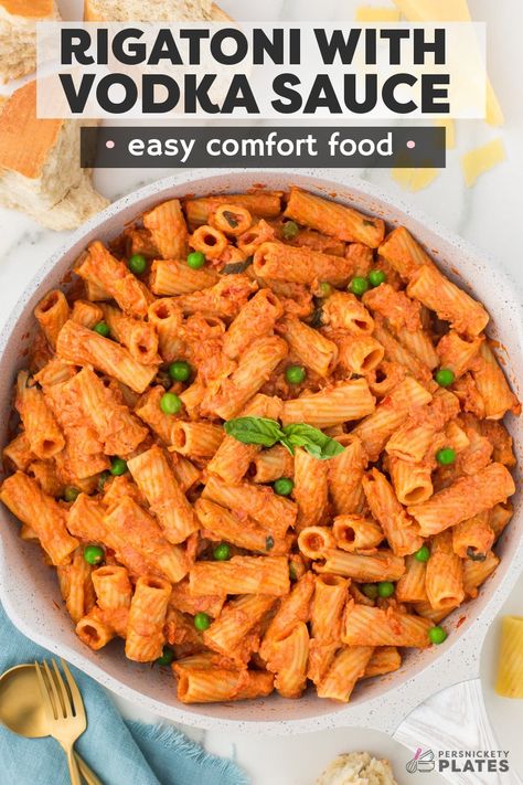 Vodka Rigatoni is a scrumptious pasta dish made with al dente pasta tossed in a rich vodka sauce made with tomatoes, heavy cream, an ounce of vodka, and parmesan cheese. Finished with fresh basil and peas, this easy and elegant one-pan meal is perfect for busy weeknights and fancier occasions!  | www.persnicketyplates.com Vodka Rigatoni, Rice Ideas, Prego Sauce, Persnickety Plates, Vodka Sauce Recipe, Vodka Sauce Pasta, Rigatoni Recipes, Yummy Pasta, Vodka Pasta