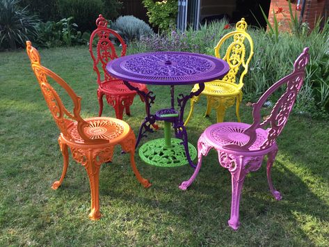 What Color To Paint Wrought Iron Patio Furniture, Whimsical Outdoor Furniture, Bistro Garden Ideas, Colourful Garden Furniture, Wrought Iron Patio Furniture Makeover, Faerie Room, Colorful Patio Furniture, She Shed Decorating Ideas, Woodland Garland