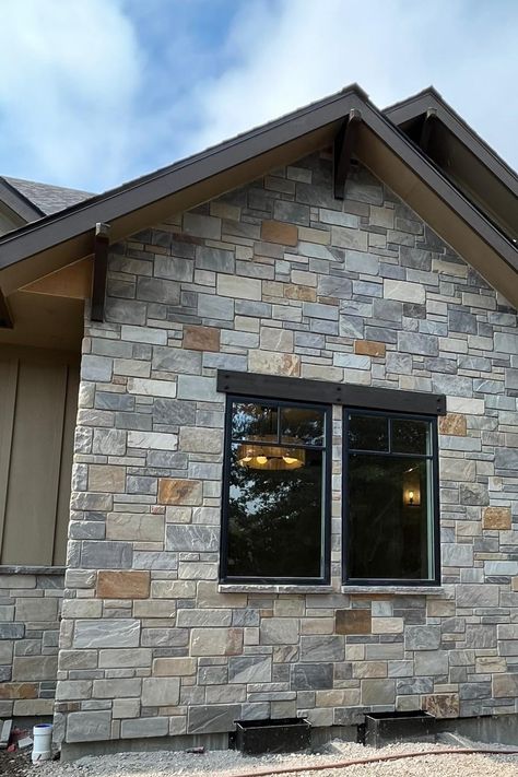 Check this out! 😍 Saddleback is such a unique color, we’re completely in love with his look! We can already tell that this home is going to be gorgeous. The exterior façade is definitely the showstopping part about this home and no one can change our minds! 😎 Along with our natural stone veneer, the watertable sills helping to tie it altogether and bring this home to life! 🥳 Stone Window Sill Exterior, House Stone Exterior Ideas, House Stone Exterior, Stone Window Sill, Stone Veneer Exterior, Traditional Meets Modern, Exterior Farmhouse, Sandstone Color, Stone Landscaping