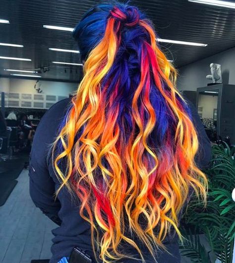 Jun 22, 2018 - Colorist Derek Cash combined blue, yellow, orange and red Matrix hair colors on his client's own hair and extensions to create this incredible transition. Sunset Hair Color, Matrix Hair Color, Ice Hair, Flame Hair, Phoenix Hair, Wild Hair Color, Sunset Hair, Fire Hair, Vivid Hair Color