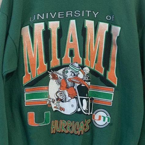 Vintage Ncaa Miami Hurricanes Shirt, University Of Miami Shirt, Unisex T-Shirt Sweatshirt , Shirt For Men Women, Vintage Shirt Product Information Promise That You Will Get The Best Products We Have. With Variety Of T Shirts Styles, Sizes And Colors. -------- Sweatshirt - Gidan 18000 -------- "Spun Yarn For Softer Feel And Reduced Pilling Double-Needle Stitching At Shoulders, Armholes, Neck, Waistband And Cuffs 1x1 Rib With Spandex For Enhanced Stretch And Recovery Classic Fit Tubular Body Grey Colorado Hoodie, Miami Shirt, Hoodie Logo, Men Sweatshirt, Black Crewneck, University Of Miami, Dog Sweatshirt, Graphic Crewneck Sweatshirt, Unisex Tshirt