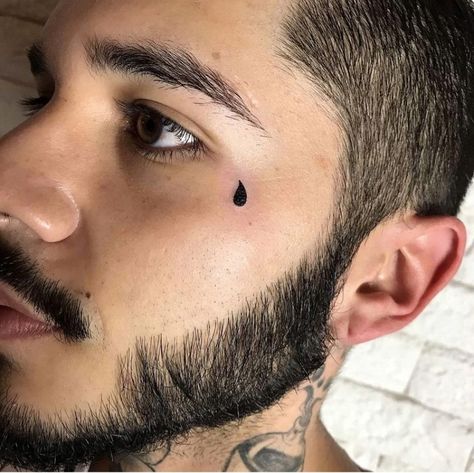 20+ Tear Tattoo Design Ideas - The XO Factor Teardrop Tattoo Face, Tear Drop Tattoos On Face, Tear Tattoo Face, Tears Tattoo Ideas, Tear Tattoo Design, Tears Tattoo, Tear Tattoo, Under Eye Tattoo, Teardrop Tattoo