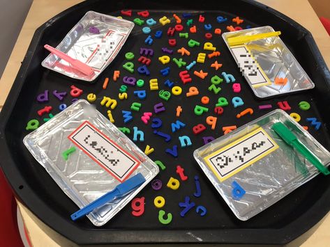 EYFS Name building game with magnetic letters and magnets Name Writing Eyfs, Name Building, Name Writing Activities, Phonics Ideas, Magnet Activities, Table Activities, Nursery Classroom, Reception Class, Continuous Provision