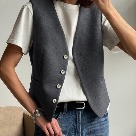 🌟 Elevate your style game with our Neutral Minimalist Gray Sleeveless Waistcoat Vest Two-Piece Set! Perfect for those who love a chic, streamlined look. Whether you’re heading to the office or stepping out for a casual day, this set is effortlessly stylish and incredibly versatile. 🌿💼 Ready to make a statement? Tap the link to shop now: https://weczon.com/collections/women/products/neutral-minimalist-gray-sleeveless-waistcoat-vest-two-piece-set #MinimalistFashion #StyleEssentials #WearItLoveIt Sleeveless Vest Outfits For Women, Queer Style, Sleeveless Waistcoat, Gray Vest, Summer Neutrals, Neutral Minimalist, Polyester Pants, Looks Street Style, Cardigan Sweater Jacket