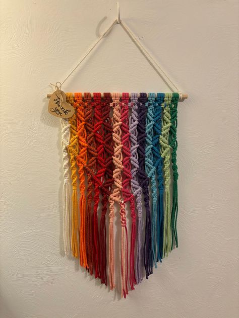 Brighten up your space with this one-of-a-kind macrame wall hanging! Approximately 25" long from top to bottom hanging on a 12" wooden dowel. *Please note that monitor settings, color settings, and lighting may cause shifts in product colors shown and slight variations may occur. Hook not included* Message me for custom orders, comments, questions, or concerns! Macrame Wall Hanging Colorful, Macrame Hammock Pattern, Diy Boho Wall Decor, Rainbow Macrame Wall Hangings, Colored Macrame, Wall Macrame, Free Macrame Patterns, Textile Tapestry, Makramee Diy