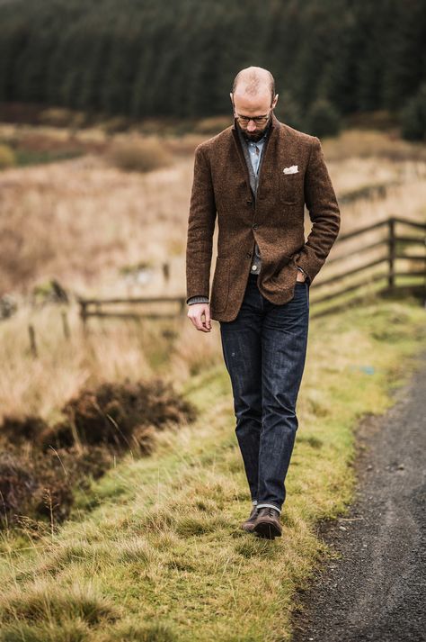 Simon Crompton in tweed and jeans.  "Tweed jacket from Elia Caliendo, shawl-collar cardigan and cream cashmere handkerchief from Anderson & Sheppard, bespoke high-waisted jeans from Levi’s, and waxed boots from the now long-gone Lodger." Tweed Jacket And Jeans, Tweed Blazer Men, Tweed Jacket Men, Tweed Jacket Outfit, Smart Casual Jackets, Bespoke Jacket, Brown Tweed Blazer, Tweed Sport Coat, Harris Tweed Jacket