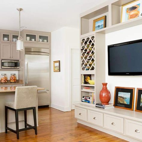 Boost Storage with a Single Wall. Could consider this idea on the wall in the living room?? Built In Tv Wall, Tv Shelving, Built In Tv Wall Unit, Built In Tv, Built In Wine Rack, Budget Remodel, Entertainment Wall, Tv Wall Unit, Tv Wall Design