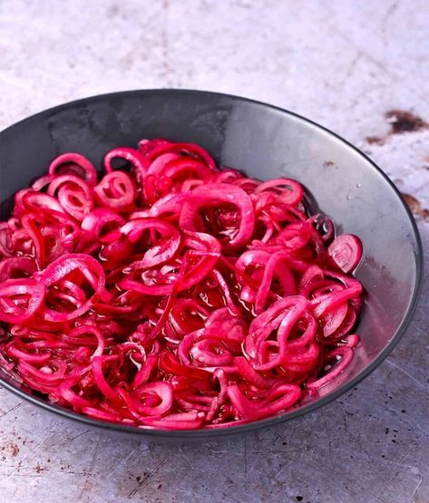 Try this no cook recipe for quick pickled red onions once, and you'll be hooked! 4 basic ingredients, a quick onion massage, and an hour of marinating time makes the best pickled onion side dish ever!I've added to my quick pickle recipes with Mexican Escabeche vegetables and the lime pickled onions I use for Mexican black bean dip, but this red onions recipe continues to be a most-requested condiment. It's been added to many home cook menus throughout the years. Add a vibrant blast… Onion Ideas, Onion Side Dish, Vegan Chickpea Burger, Quick Pickle Recipe, Quick Pickle, Pickled Red Onion, Onion Rings Recipe, Red Onion Recipes, Quick Pickled Red Onions