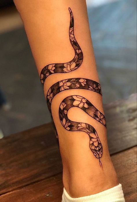 Snake tattoos can mean so much more than you ever imagined. But we are ready to reveal the truth about them and share the most incredible tattoo designs with you. Snake Wrap Around Ankle Tattoo, Snake Tattoo Ankle Wrap, Snake Foot Tattoos For Women, Snake Wrapped Around Ankle Tattoo, Wrap Around Snake Tattoo Leg, Leg Snake Tattoos Women, Snake Around Ankle Tattoo, Snake Tattoo Leg Wrap, Snake Thigh Tattoo Women