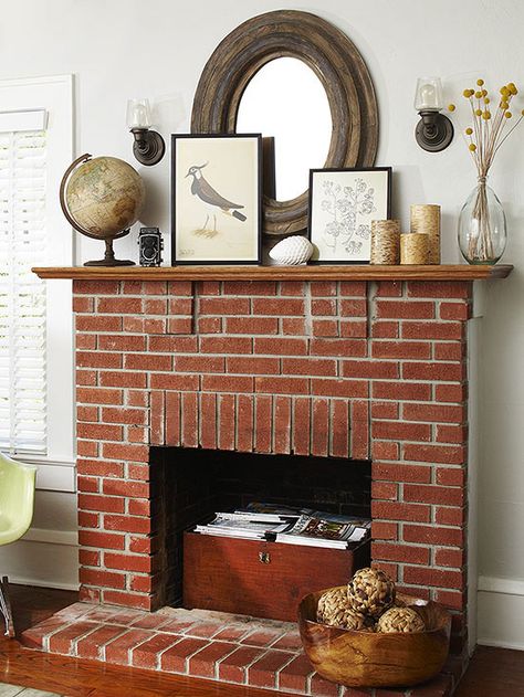 Style: Craftsmen Against plain walls, this red brick fireplace has a rustic and warm feel that brings instant character to the room. Even though the homeowners might not use the fireplace as a heat source, it still serves a purpose and becomes a niche to store magazines and other reading material. With its clean lines and simple look, the fireplace can be decorated with several accessories without looking too cramped and cluttered./ Red Brick Fireplace, Brick Fireplace Decor, Fireplace Styles, Brick Fireplace Wall, Design Camino, Red Brick Fireplaces, Rustic Fireplace Mantels, Brick Hearth, Painted Brick Fireplace