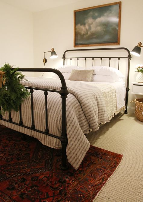 Bedroom Vintage Gallery Wall, Simple Made Bed, Farmhouse Striped Bedding, Organic Modern Bedroom Black Bed, How To Make A Guest Bed, Striped Duvet Bedroom, Iron Bed Frame Bedroom Decor, Striped Comforter Bedroom, Black Iron Bed Decor