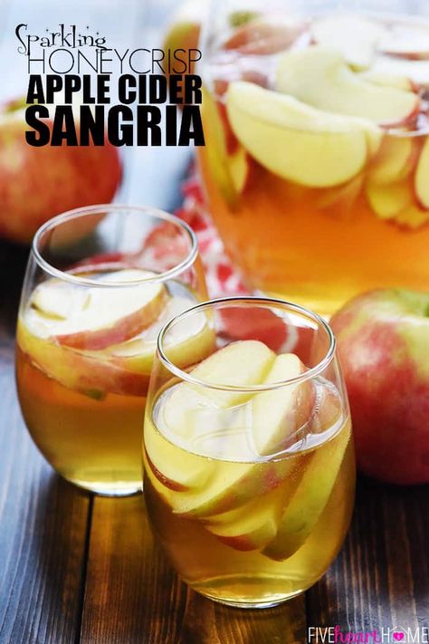 Sparkling Apple Cider Sangria ~ a festive fall cocktail recipe with just three ingredients -- white wine, apple cider, and sweet sliced Honeycrisps -- perfect for tailgating, Halloween, Thanksgiving, and even Christmas! | FiveHeartHome.com Sparkling Apple Cider Sangria, Autumn Sangria, Apple Sangria Recipes, Apple Cider Sangria Recipe, Fall Sangria Recipes, Moscato Sangria, Caramel Apple Sangria, Sparkling Apple Cider, White Wine Sangria Recipe