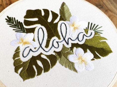 Hawaii hand embroidery patterns with aloha and monstera, plumeria, palm leaves, and banana leaves Hawaii Embroidery Pattern, Hawaiian Embroidery Patterns, Plumeria Embroidery, Hawaiian Embroidery, Hawaii Embroidery, Cherry Blossom Origami, Tropical Embroidery, Aloha Flower, Flower Embroidery Pattern