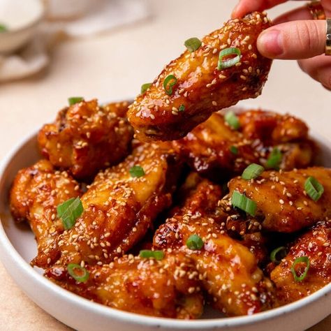 Are you looking for a quick and flavorful dish that's perfect for any occasion? Look no further than these Air Fryer Honey Garlic Wings! These wings are crispy on the outside, tender on the inside, and coated in a sweet and savory sauce that's out of this world. Honey Garlic Air Fryer Wings, Air Fryer Bbq Wings, Air Fryer Party Wings, Garlic Chicken Wings Air Fryer, Air Fryer Wings Recipe, Honey Garlic Wings, Honey Chicken Wings, Garlic Wings, Party Wings