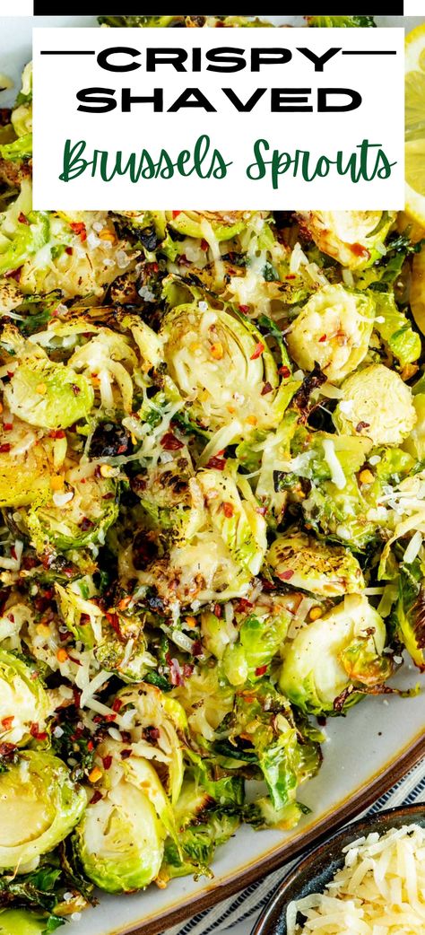 This Roasted Shaved Brussels Sprouts recipe couldn't be easier, and the result is crispy, savory goodness that will make you want to inhale an entire bowl. This recipe is a winner if you're looking for a side dish that is sinfully delicious. Baked Shaved Brussel Sprouts, Sliced Brussels Sprouts Recipe, Recipes With Shaved Brussel Sprouts, Shaved Roasted Brussel Sprouts, Sliced Brussel Sprout Recipes, Brussel Sprout Recipes Shredded, Brussel Sprout Recipes Shaved, Brussels Sprout Dinner Recipes, Chopped Brussel Sprout Recipes