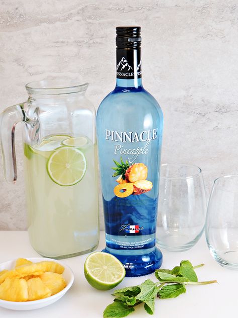 Easy cocktail recipe! Pineapple Vodka Limeade, sponsored by @pinnaclevodka - All you need is Pinnacle Pineapple Vodka, limeade, limes, pineapples, mint, and ice. Perfect for summer! #PinnacleCocktailClub Flavored Vodka Drinks, Vodka Mixed Drinks, Easy Cocktail Recipe, Pinnacle Vodka, Limeade Recipe, Pineapple Vodka, Summer Vodka Cocktails, Pineapple Drinks, Vodka Cocktails Recipes