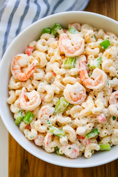 This shrimp pasta salad recipe is perfect for a light and refreshing meal! Packed with juicy shrimp, vibrant veggies, and flavor-packed herbs, this salad is a delicious combination of textures and flavors. It's easy to make and great for meal prep or gatherings. Whether you're hosting a summer barbecue or looking for a quick weeknight dinner idea, this shrimp pasta salad is sure to impress. Shrimp Pasta Salad Recipes Cold Old Bay, Seafood Pasta Salad Crab And Shrimp, Shrimp Pasta Salad Recipes, Pasta Salad Shrimp, Pasta Shrimp Salad, Shrimp Macaroni Salad, Rotini Pasta Salad, Shrimp Pasta Salad, Seafood Salad Pasta